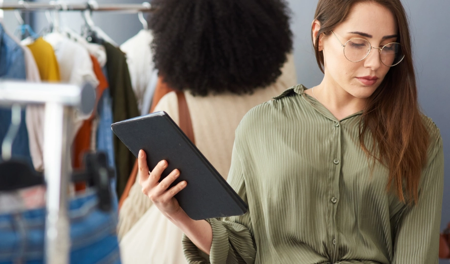 woman holding ipad