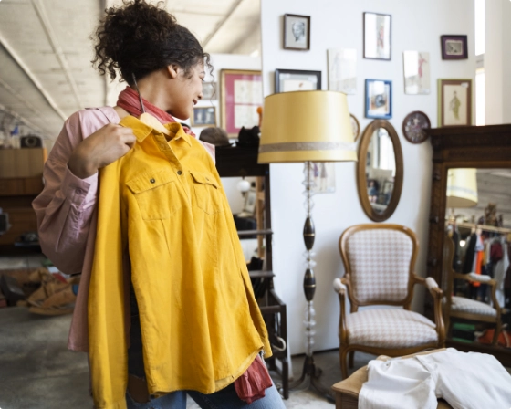 Woman holding shirt